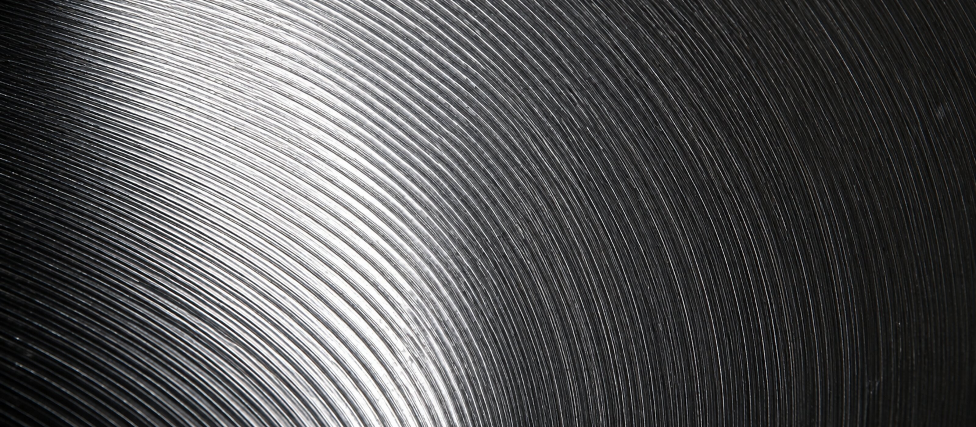 Extreme close-up of a precision-machined aluminium surface